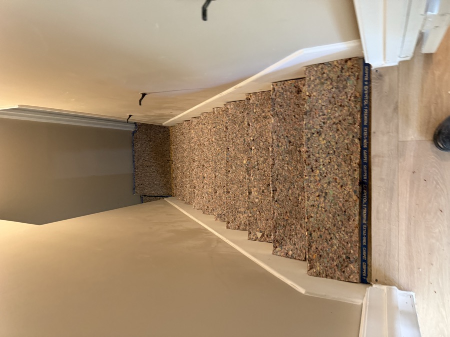 The same stairs with new carpet fitted, after