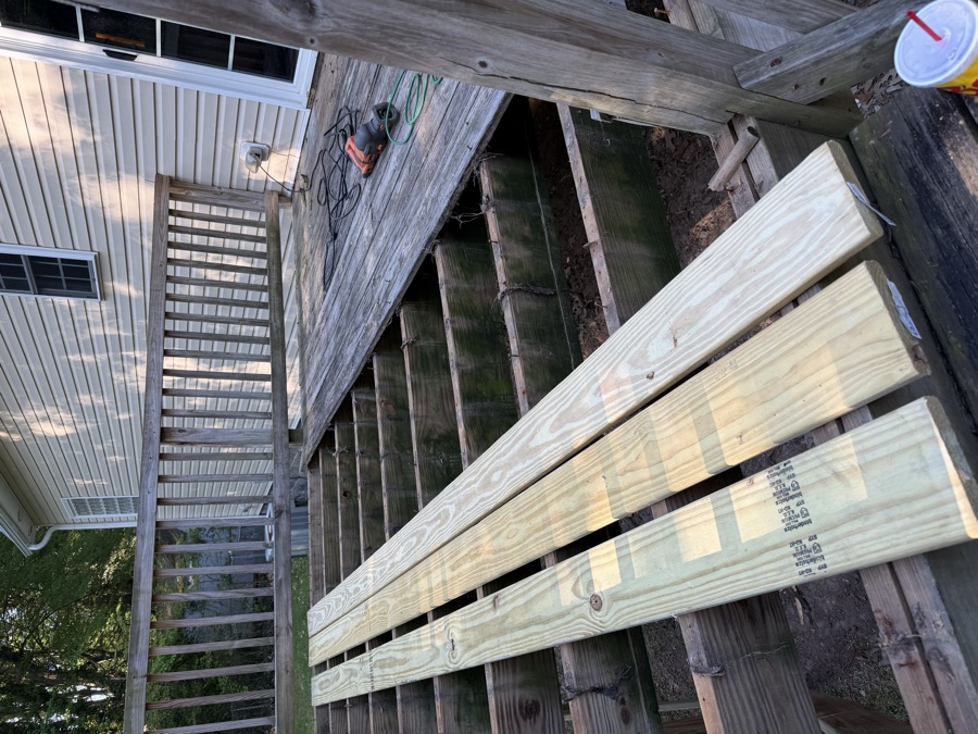Weathered gray deck steps, before