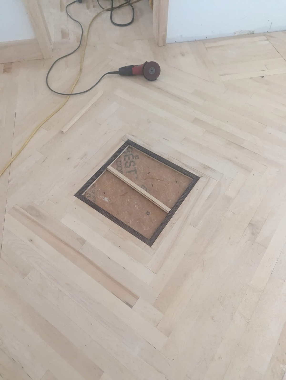 A custom double-border inlay in a hardwood floor